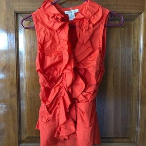 Arden B sleeveless button up shirt.